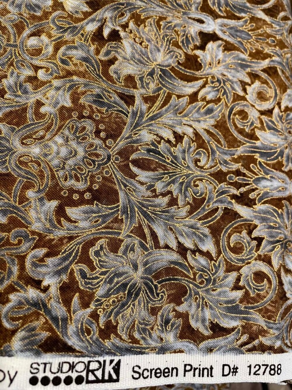 Robert Kaufman, La Scala 4, Brown and Rust with metallic gold.  Sold by the yard